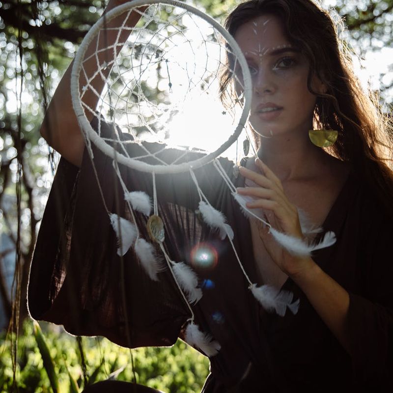 Woman in a calm meditative pose symbolizing harmony and balance.
